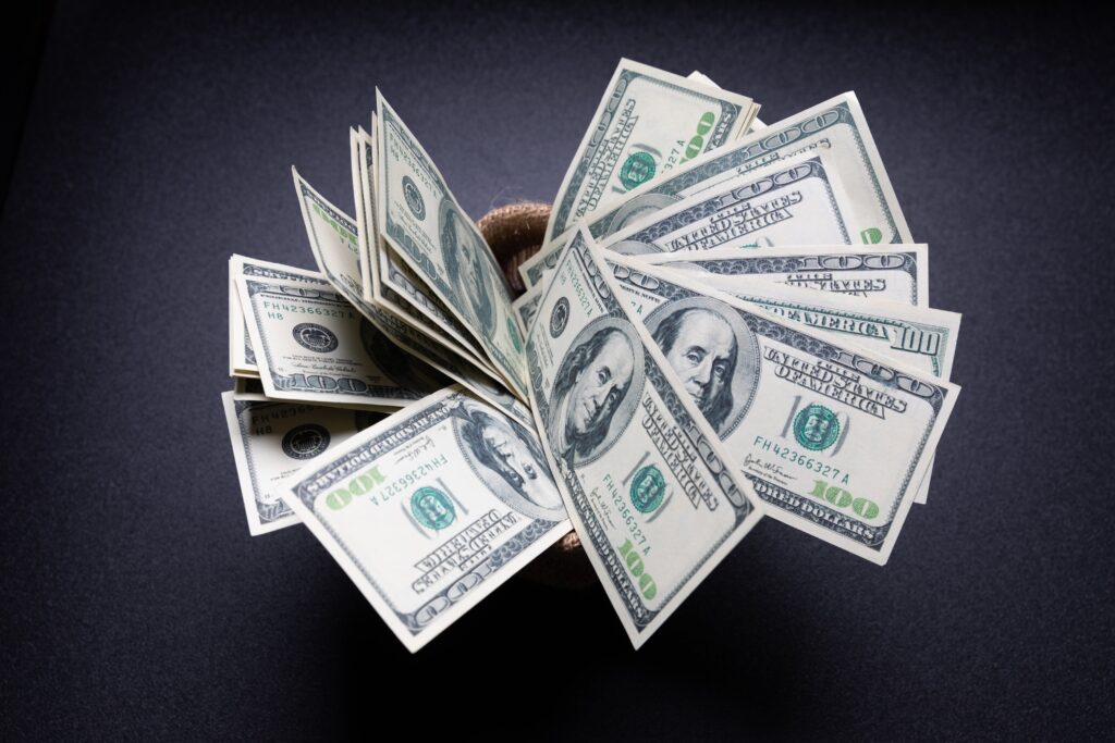 Home 4 american dollars cash money sack black table dark room min